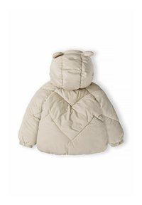 Beidzis pūšamais jaka ar kapuci, kas ir aprīkota ar lāču ausīm, dimanta formas izšuvumu, elastīgām aprocēm un noapaļotu formu.