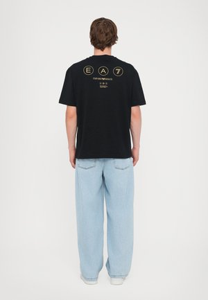 TRAIN LOGO TEE UNISEX - Print T-shirt - black/gold coloured
