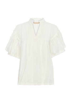 Valge pluus lühikeste, laienevate varrukatega, V-kaelusega, tekstureeritud kangast ja vertikaalsete triipudega. Fookuseks on dekoratiivne ääris allääres.