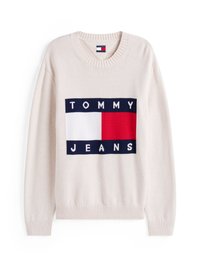 Kreemidest kampsun, millel on soonikuga mansetid ja kaelus. Esiküljel on ruudukujuline logo tumesinisest, valgest ja punasest, millel on kiri "TOMMY JEANS". Pehme tekstuur.
