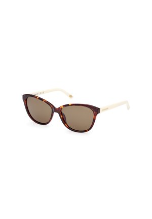 Tortoiseshell sunglasses with a cat-eye shape, brown lenses, and cream-colored temples featuring slight gold accents.