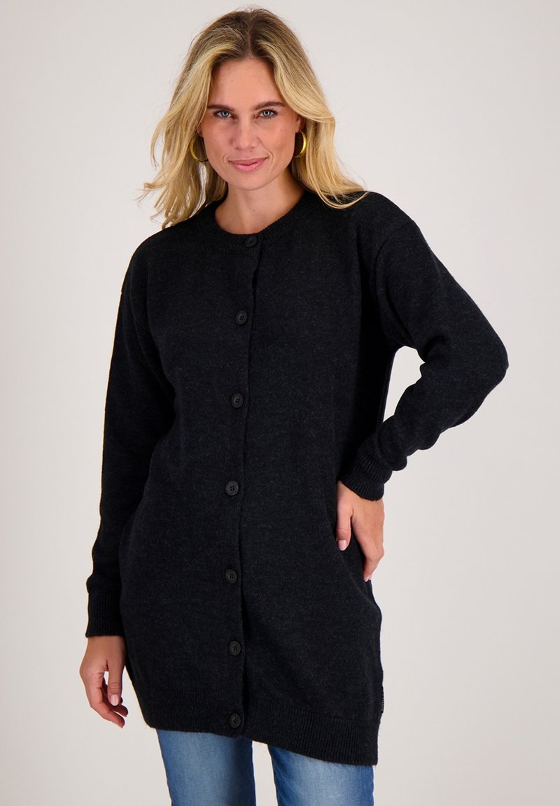 Zwarte cardigan van zachte stof, met een knoopsluiting aan de voorkant, lange mouwen, geribde manchetten en een ontspannen pasvorm met zijzakken.