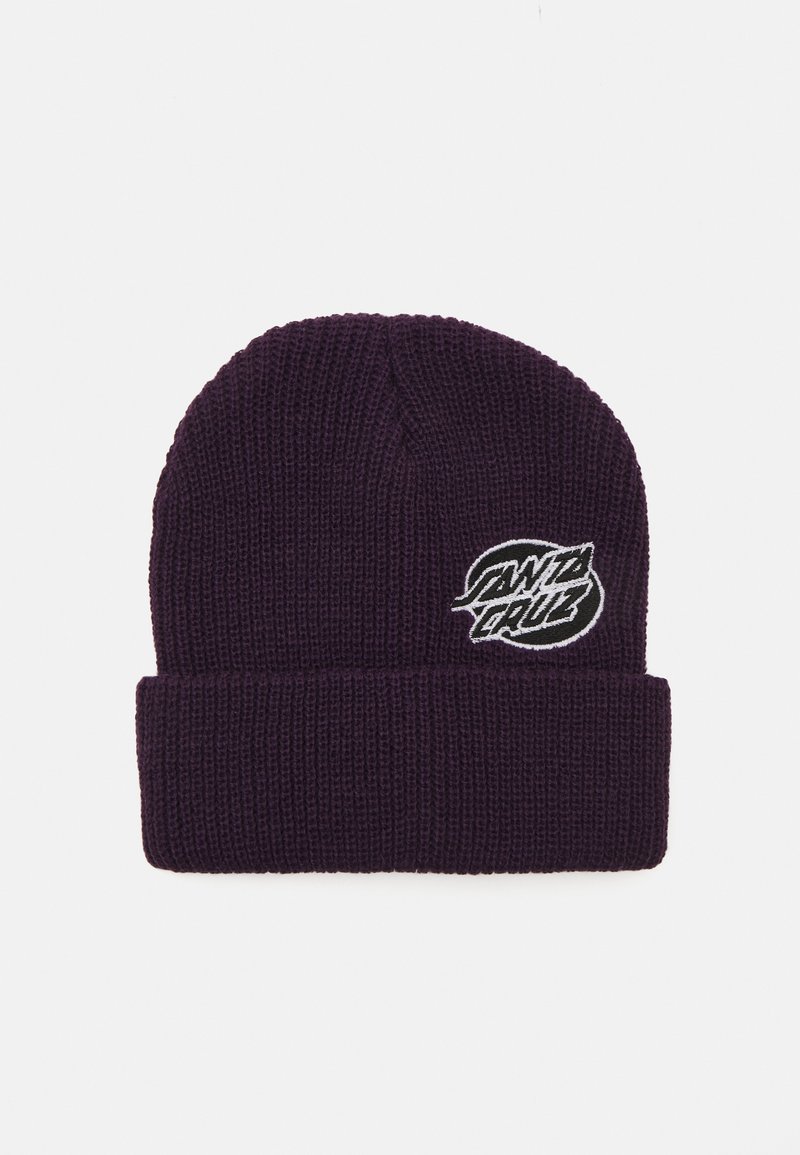 Tumši violetas adītas bēnijas ar salocītu aproci, uz kuras ir balts izšūts "Santa Cruz" logo. Audums ir ribots un stiepjas.