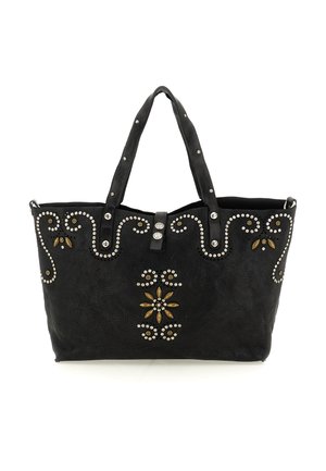 Borsa tote in pelle nera con design decorati da borchie e accenti floreali. Presenta doppi manici e una superficie testurizzata.
