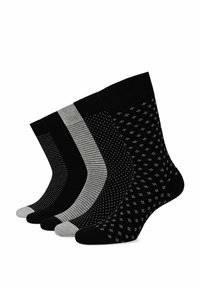 Cztery pary skarpetek w kolorach czarnym i szarym. Cechy obejmują jednolite, w paski i w kropki wzory; różne tekstury; oraz kontrastowe kolory palców.