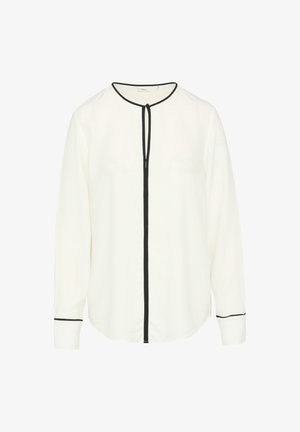 Wit blouse met lange mouwen en zwarte accenten. Heeft een ronde hals met een striksluiting en manchetten, gemaakt van een gladde stof.