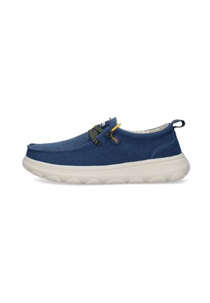 Scarpa casual blu navy senza lacci con suola spessa bianca, lacci elastici gialli e neri, linguetta in tessuto sul tallone.