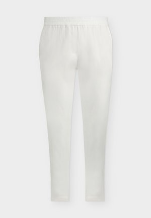 Pantalon blanc à taille élastique avec une jambe slim et fuselée, sans poches visibles ni détails supplémentaires sur un fond uni.