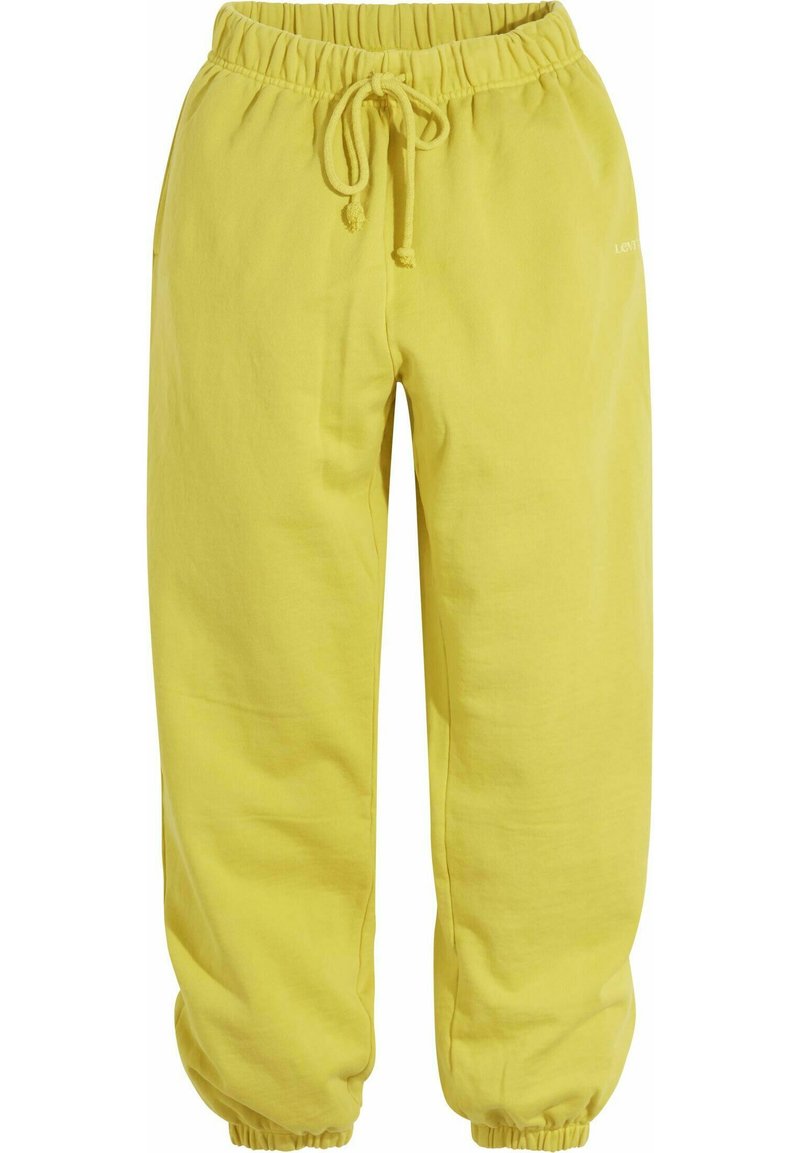 Geel sweatpants gemaakt van zachte stof, voorzien van een elastische tailleband met een trekkoord, omgeslagen enkels en zijzakken.