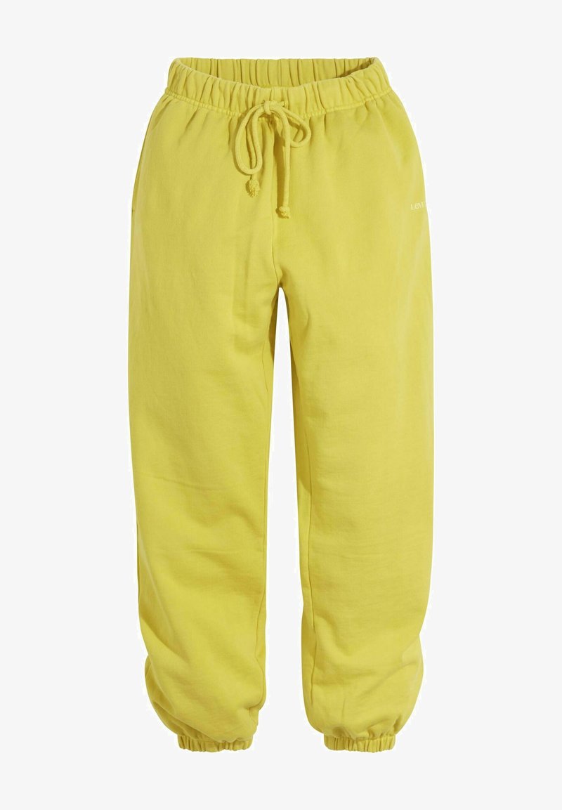 Geel sweatpants gemaakt van zachte stof, voorzien van een elastische tailleband met een trekkoord, omgeslagen enkels en zijzakken.