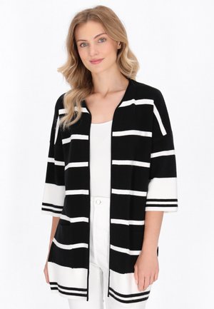 Schwarz-weißer gestreifter Cardigan mit offenem Vorderteil, 3/4-Ärmeln und Taschen. Weicher Stoff, lockere Passform und horizontale Streifen.
