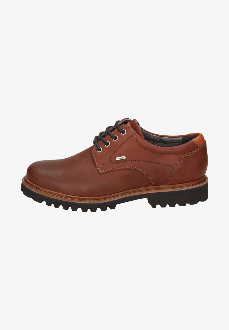 Brauner Lederschuh mit runder Zehenform, Schnürdesign, texturierter Oberfläche und robuster schwarzer Gummisohle mit tiefen Profilen.