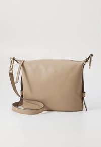 Beige leather crossbody bag with adjustable strap and gold-tone hardware, smooth texture, and zippered top closure.