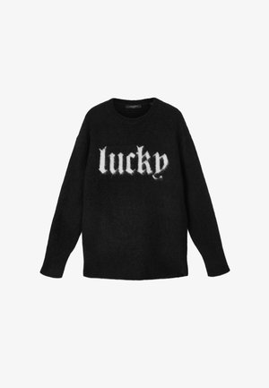 Must sallter pehme tekstuuriga, eesvalgel valge karvase kirjaga sõnaga "lucky". Ümar kaelus ja pikad varrukad.