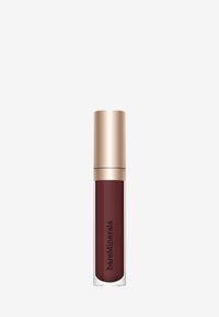 Rouge à lèvres liquide dans un tube transparent avec un capuchon doré. Teinte bordeaux profond, texture lisse, étiqueté "bareMinerals" sur le côté.