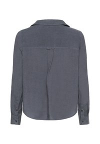 Chemise à boutons, en lin gris foncé, à manches longues, avec un col, un ourlet courbé, un pli au dos, des poignets boutonnés, texture lisse.
