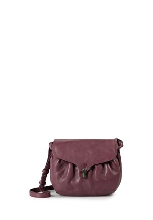Small purple leather crossbody bag with flap closure and adjustable strap against white background.