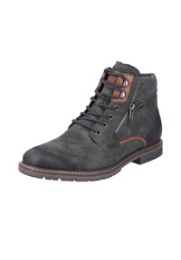 Bottes molletière en daim gris foncé avec accents en cuir marron, lacets à l'avant, fermeture éclair latérale et semelle en caoutchouc. Détail de couture le long du bord.