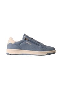 Baskets décontractées bleues avec semelle blanche, fermeture éclair latérale, lacets et logo « Redskins » sur le côté extérieur près de la fermeture éclair.