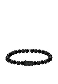 Black bead bracelet featuring a mix of smooth and matte spherical beads, with a unique textured centerpiece and a small silver tag.