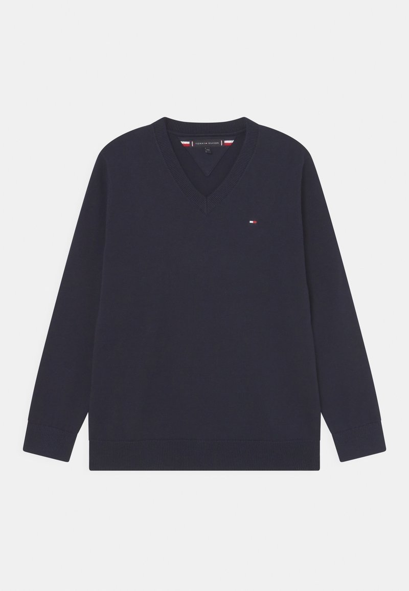 Pull bleu marine à col en V manches longues avec petit logo drapeau Tommy Hilfiger sur la poitrine gauche et poignets et bas côtelés.