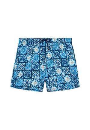 Siniset uimashortsit, joissa on kuvioitu laatta-aihe sinisen ja valkoisen sävyissä sekä tummansininen kiristysnyöri vyötäröllä.