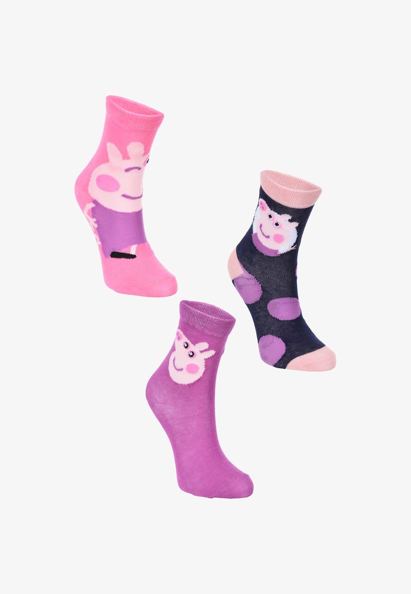 Tres pares de calcetines para niños: rosa con una cara de dibujos animados, morado con una cara sonriente y azul marino con lunares y una cara de personaje.