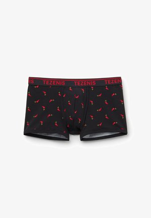 Boxer da uomo neri con un motivo ripetuto di peperoncini rossi. Fascia elastica con la scritta "TEZENIS" in grassetto rosso. Tessuto morbido e stretchy.