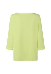 Helles Gelb, locker sitzendes Oberteil mit quadratischem Ausschnitt und Dreiviertelärmeln. Weicher Stoff, minimalistisches Design ohne zusätzliche Muster.
