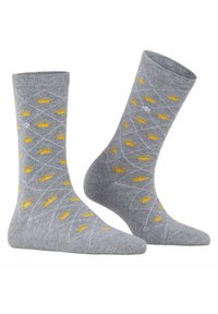 Szare skarpetki w diamentowy wzór, z żółtymi koronami. Wykonane z miękkiego materiału, mają ściągacz i gładką teksturę.
