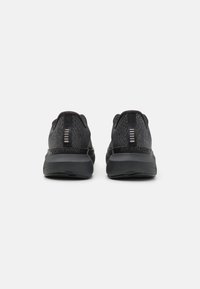 Under Armour INFINITE PRO STORM - Hardloopschoenen voor op de weg - black