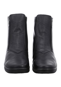 Schwarze Lederstiefeletten mit einem Reißverschluss vorne, strukturierten Mustern und einer abgerundeten Zehenpartie, ausgestattet mit einer flexiblen Gummisohle für zusätzlichen Komfort.