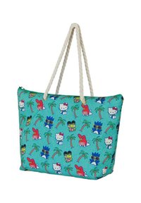 Bolsa de tela con una tela turquesa que presenta un patrón repetido de Hello Kitty, palmeras y un asa de cuerda. Cierre de cremallera en la parte superior.