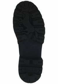 Suola di scarpa in gomma nera con texture rigata, un design di unicorno in rilievo e il nome del marchio "MUSTANG" impresso vicino al bordo.