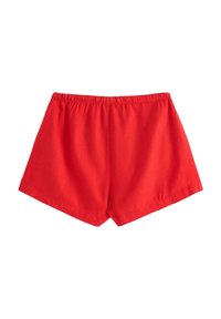 Röda bomullsshorts med elastisk midja, med en enkel design och rak passform utan fickor eller ytterligare detaljer.