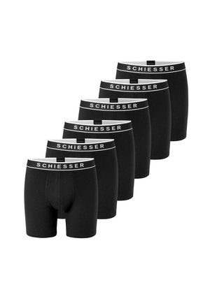 Seks sorte boxershorts med hvide linninger i taljen, der viser mærkenavnet Schiesser med fede bogstaver.