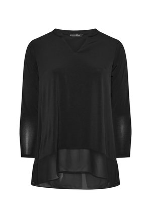 Top nero con scollatura a V e maniche a tre quarti, caratterizzato da un design a strati con orlo inferiore trasparente. Tessuto morbido e leggero.