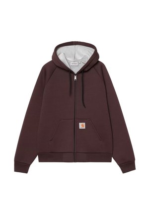 Felpa con zip marrone con interno grigio. Presenta una tasca a marsupio e una patch con logo sulla parte anteriore. Realizzata in tessuto morbido e testurizzato.