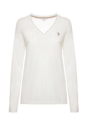 T-shirt a maniche lunghe e scollo a V in cotone color crema. Caratterizzato da un piccolo logo ricamato marrone sul lato sinistro del petto. Tessuto liscio.