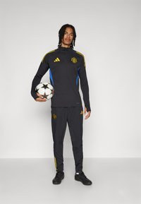 adidas Performance MANCHESTER UNITED PANT - Klubu apģērbs - black/blue/tribe yellow