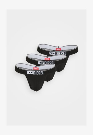 Férfi fekete alsónadrágok fehér elasztikus derékpánttal, piros és fekete "DIESEL" logóval. Simább anyagú, testhezálló szabású, három darabos készlet.