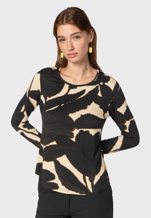 Maglietta a maniche lunghe con un motivo floreale nero e beige, colletto rotondo, texture liscia e vestibilità comoda.