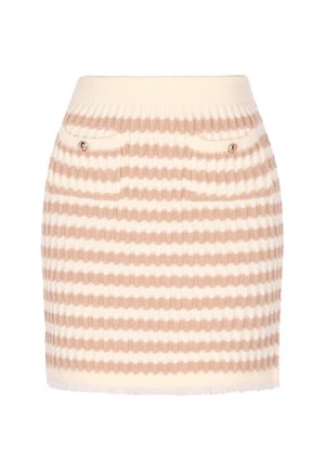 Knit mini skirt featuring alternating beige and white stripes, ribbed waistband, two front pockets with button accents, and fringe hem.