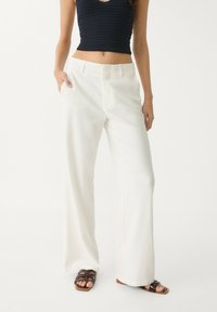 Stradivarius - FLOWING STRAIGHT-LEG - Trousers - beige Thumbnail Image 1