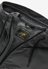 Next Jas - grey