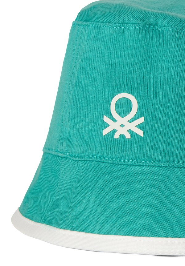 REVERSIBLE WITH TROPICAL PRINT – Hut