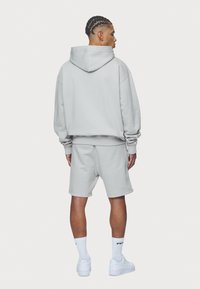 Pegador LOGO OVERSIZED  - Huppari - washed pearl grey