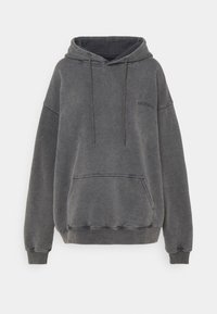 Felpa con cappuccio in tessuto grigio scuro con una vestibilità ampia. Caratterizzata da una tasca a marsupio, cappuccio con cordino e ricamo del marchio sottile.
