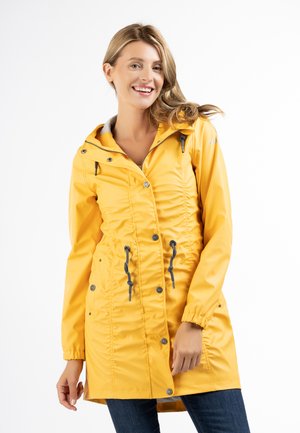 usha Regenjacke / wasserabweisende Jacke - honiggelb