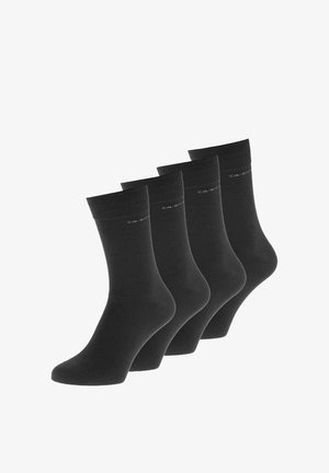 Mustad musta puuvillased sokid neljases komplektis. Neil on sile tekstuur, keskmine pikkus ja elastsed ääred, millel on pehme brändimine külgedel.
